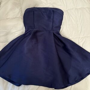 Blue mini dress with bow detail on the back